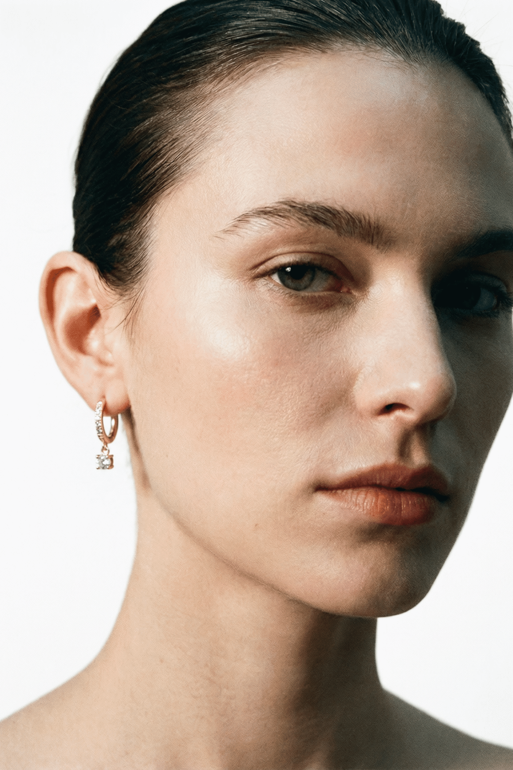 Core Spark Huggie Earrings - Image 2